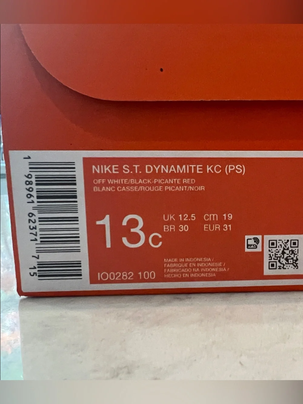 Nike Kids Dynamite Sneakers in White with Red and Blue Accents